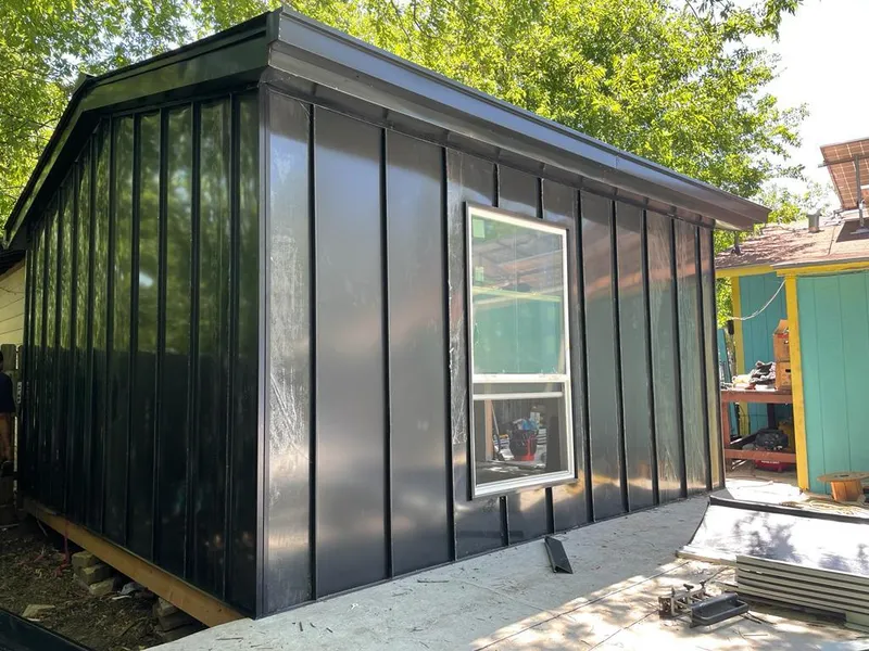 Black standing seam metal wall panels for Metal Roof Installation in Corinth